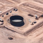 Fuel tank spill embankment